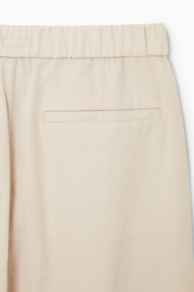 COS ストレッチテーパードツイルパンツ