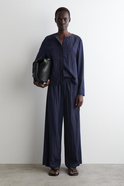 COS ジャージーパネルカーディガン