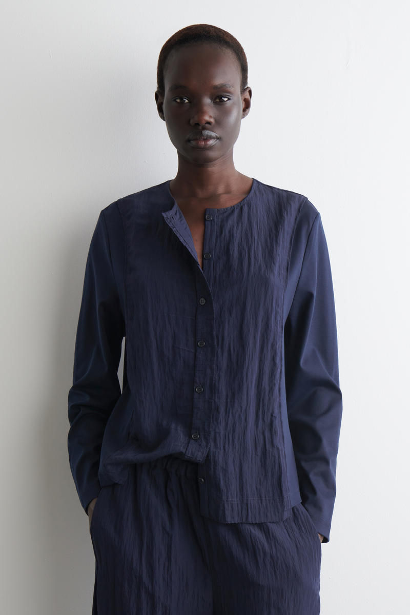 COS ジャージーパネルカーディガン