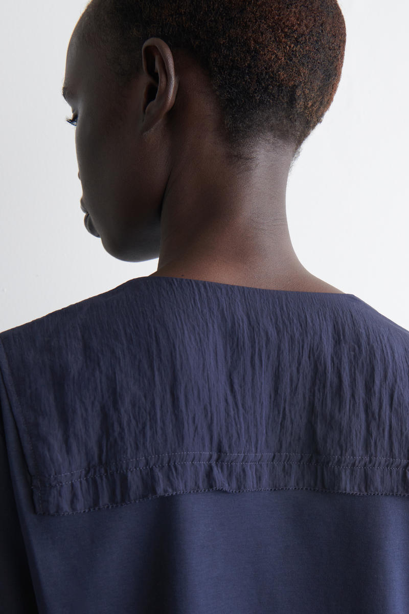 COS ジャージーパネルカーディガン