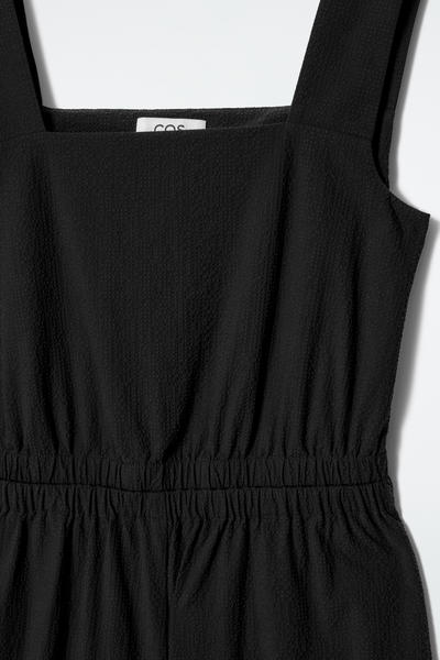 COS オープンバックワイドレッグジャンプスーツ