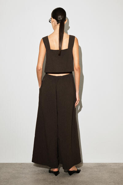 COS オープンバックワイドレッグジャンプスーツ