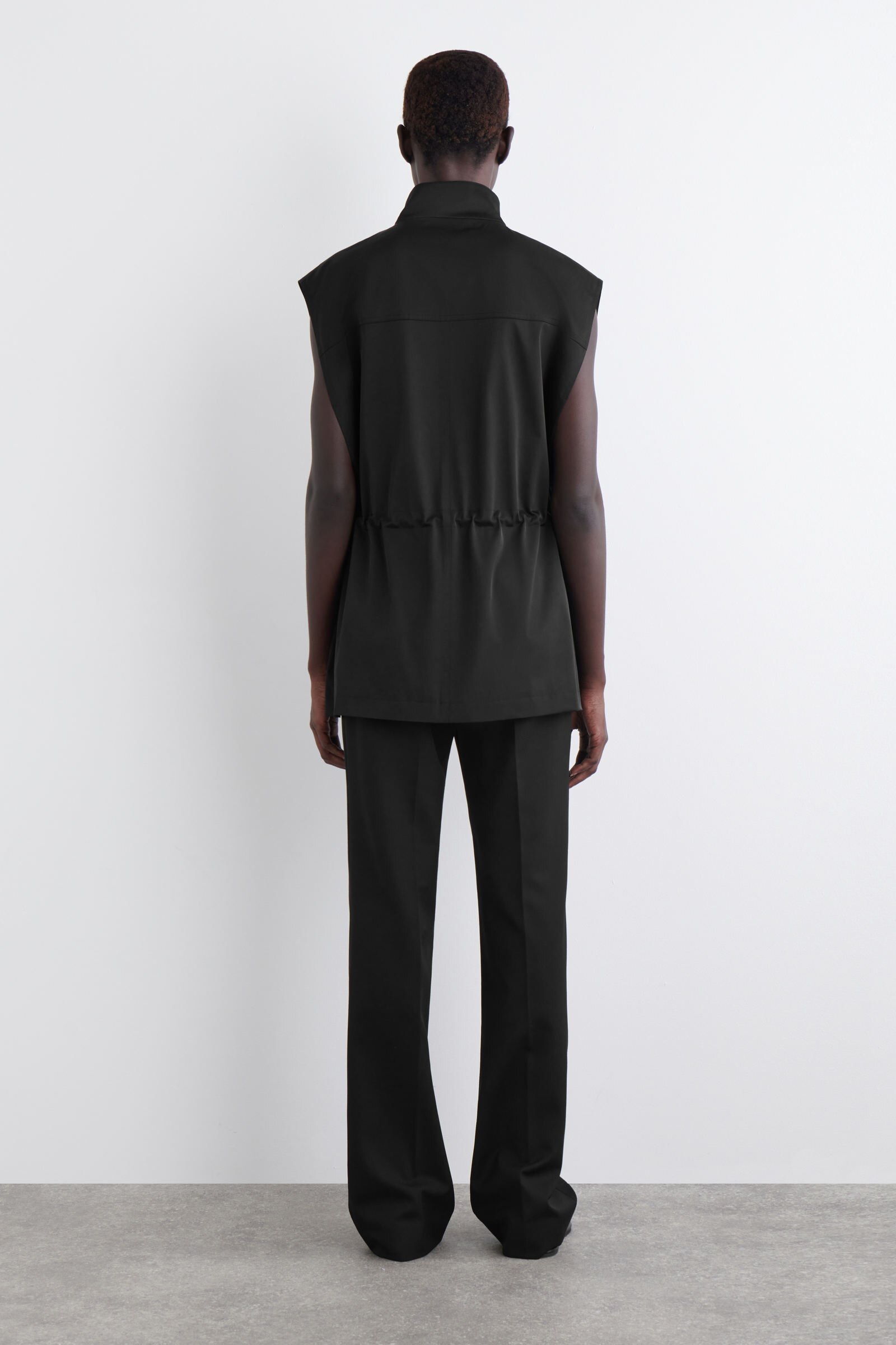 MOCK-NECK UTILITY VEST モックネックユーティリティベスト ブラック