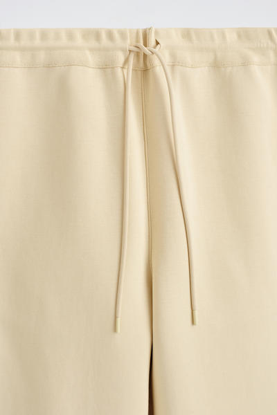 COS スキューババレルレッグジョガーパンツ