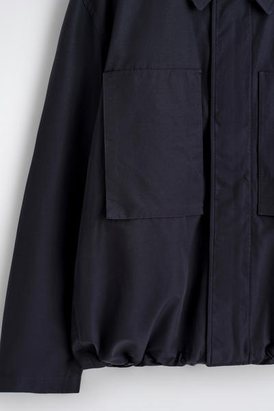 COS テクニカル ウインドブレーカージャケット