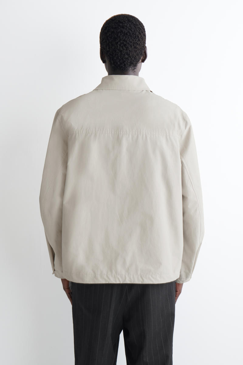 COS テクニカル ウインドブレーカージャケット