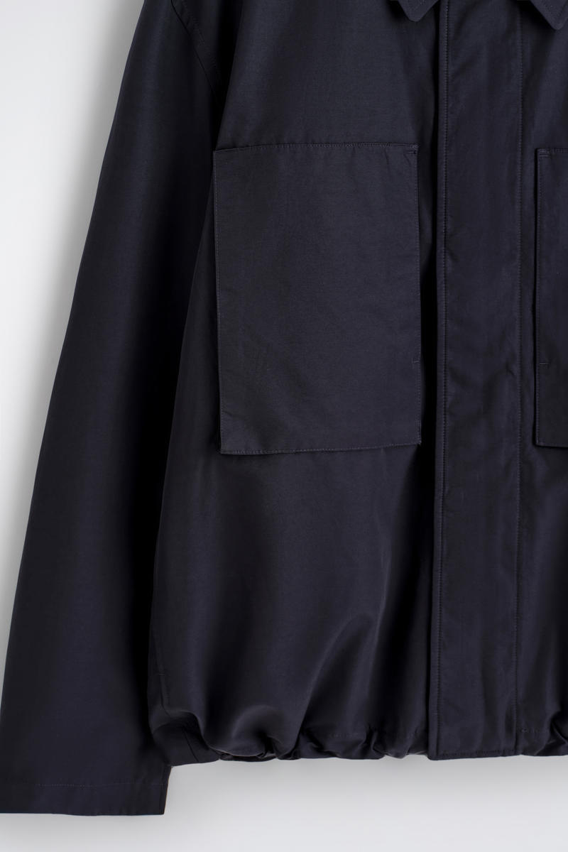 COS テクニカル ウインドブレーカージャケット