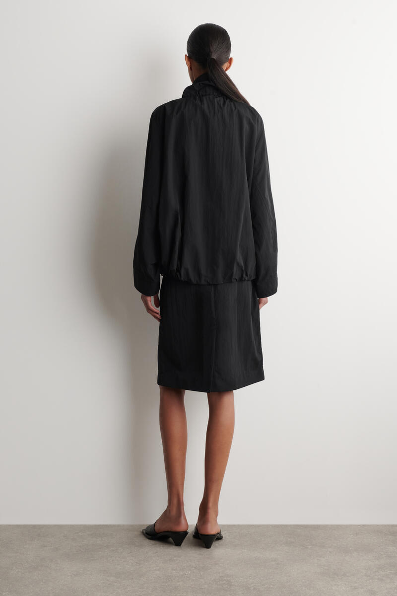 NYLON FUNNEL-NECK JACKET ナイロンファンネルネックジャケット