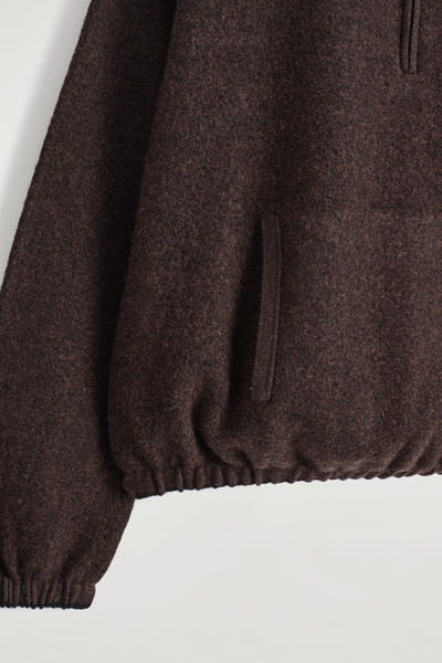 COS ボイルドメリノウールジップアップセーター