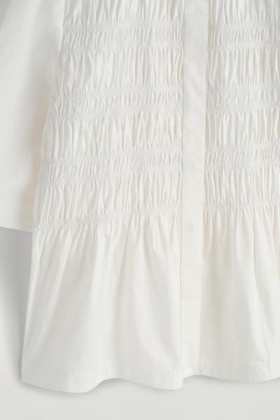 COS フリル付きコットンブラウス