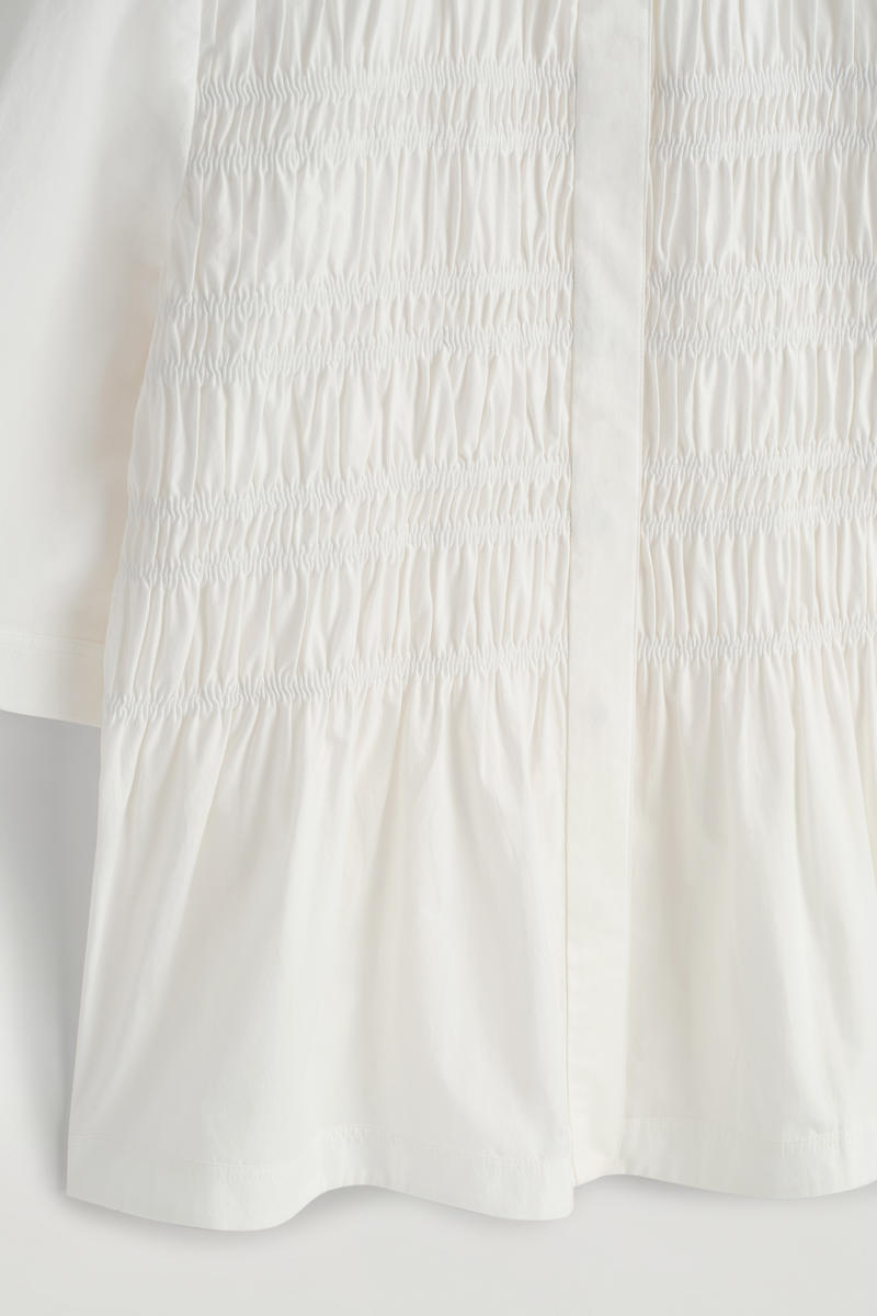 COS フリル付きコットンブラウス