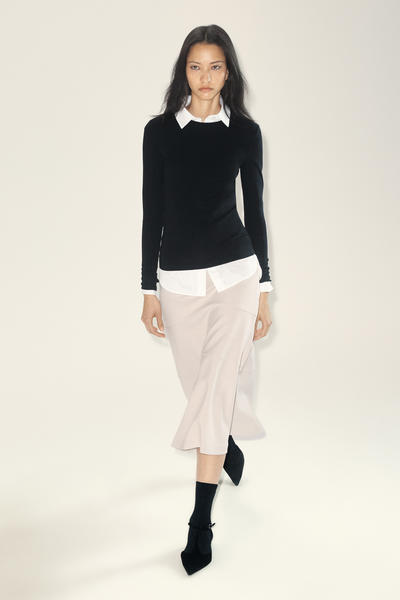 COS カーブしたAラインミディスカート