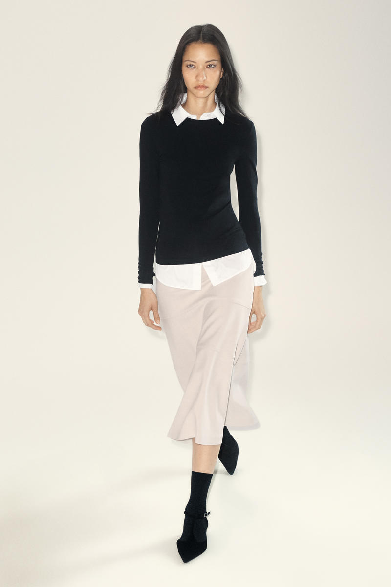 COS カーブしたAラインミディスカート