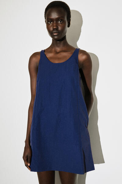 COS ジャージーパネル入り ナイロンミニワンピース