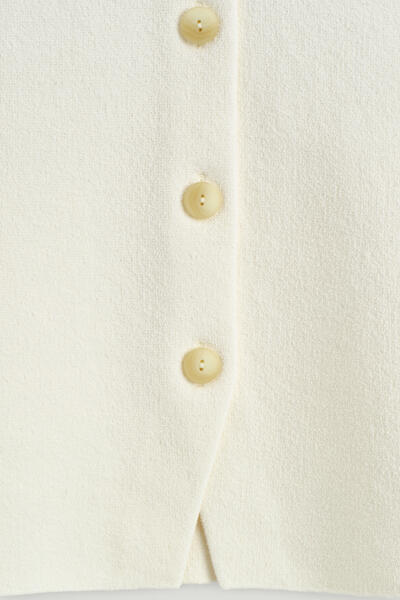 COS 彫刻的なコットンカーディガン