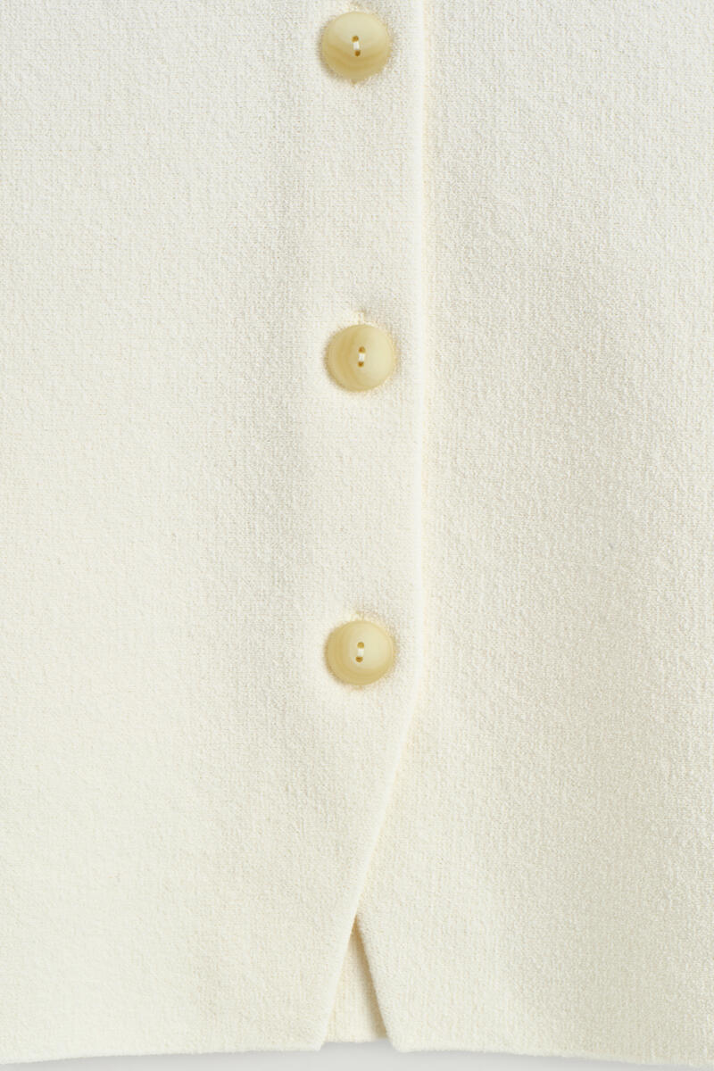 COS 彫刻的なコットンカーディガン