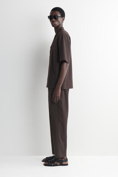 COS シアサッカー テーパードパンツ