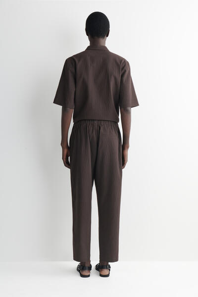 COS シアサッカー テーパードパンツ