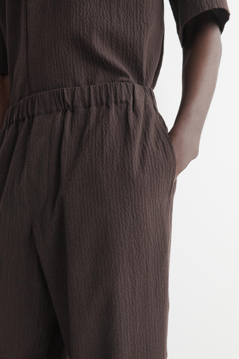 COS シアサッカー テーパードパンツ