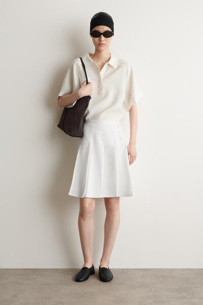 BUTTON-DETAIL PLEATED MINI SKIRT