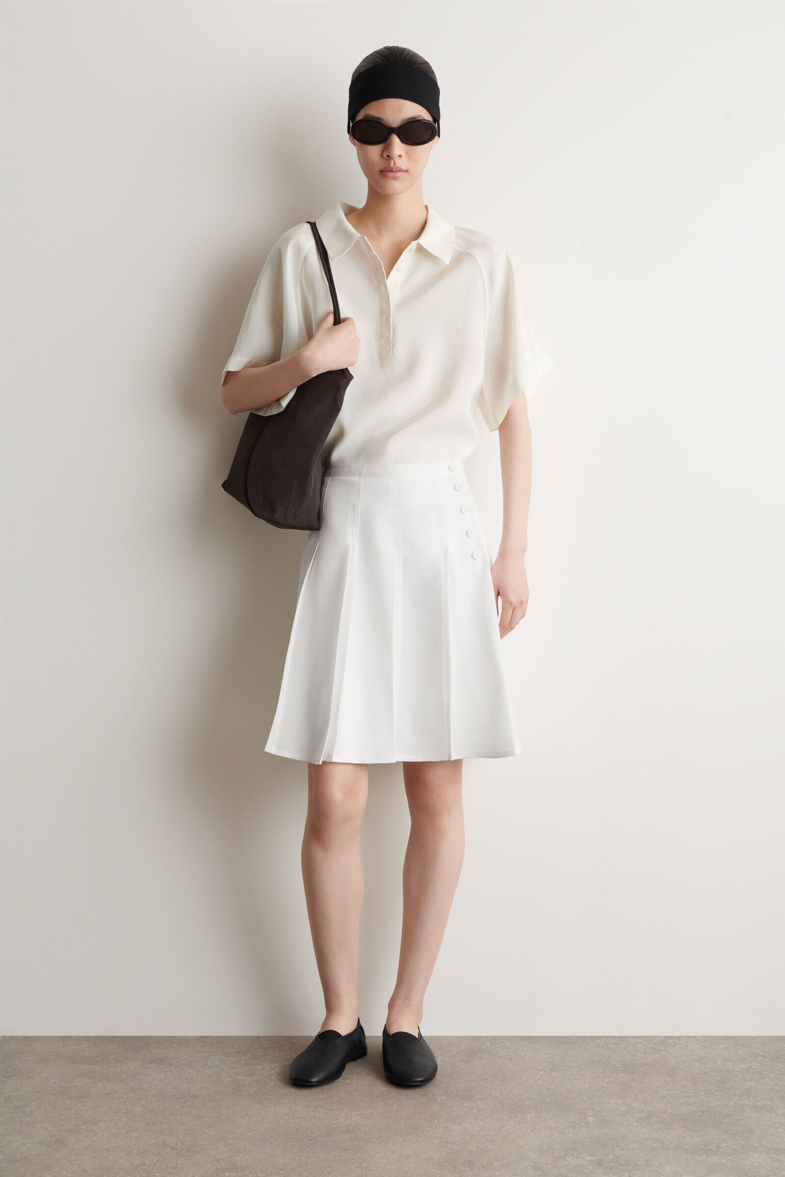 BUTTON-DETAIL PLEATED MINI SKIRT ボタンディテール プリーツミニ