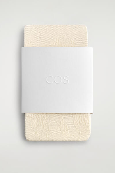 COS フローラル ジャカードレース タイツ