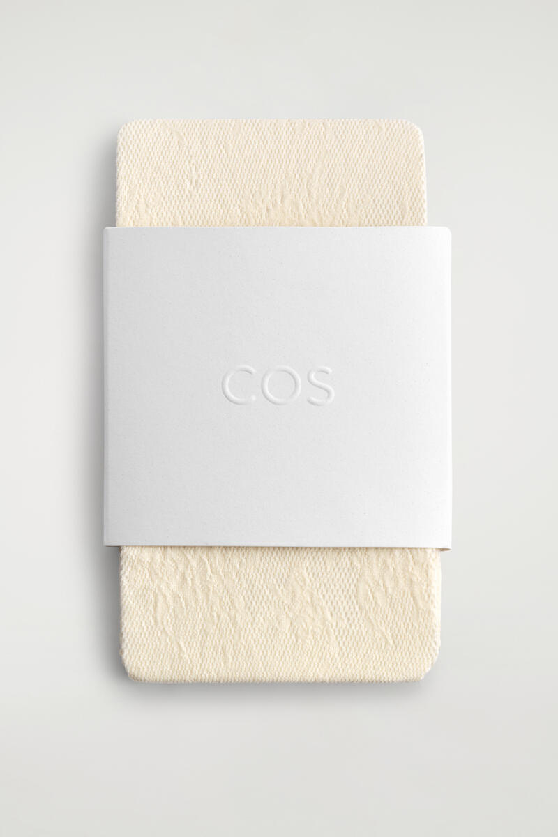 COS フローラル ジャカードレース タイツ