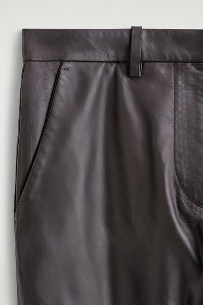 COS レザーストレートレッグパンツ
