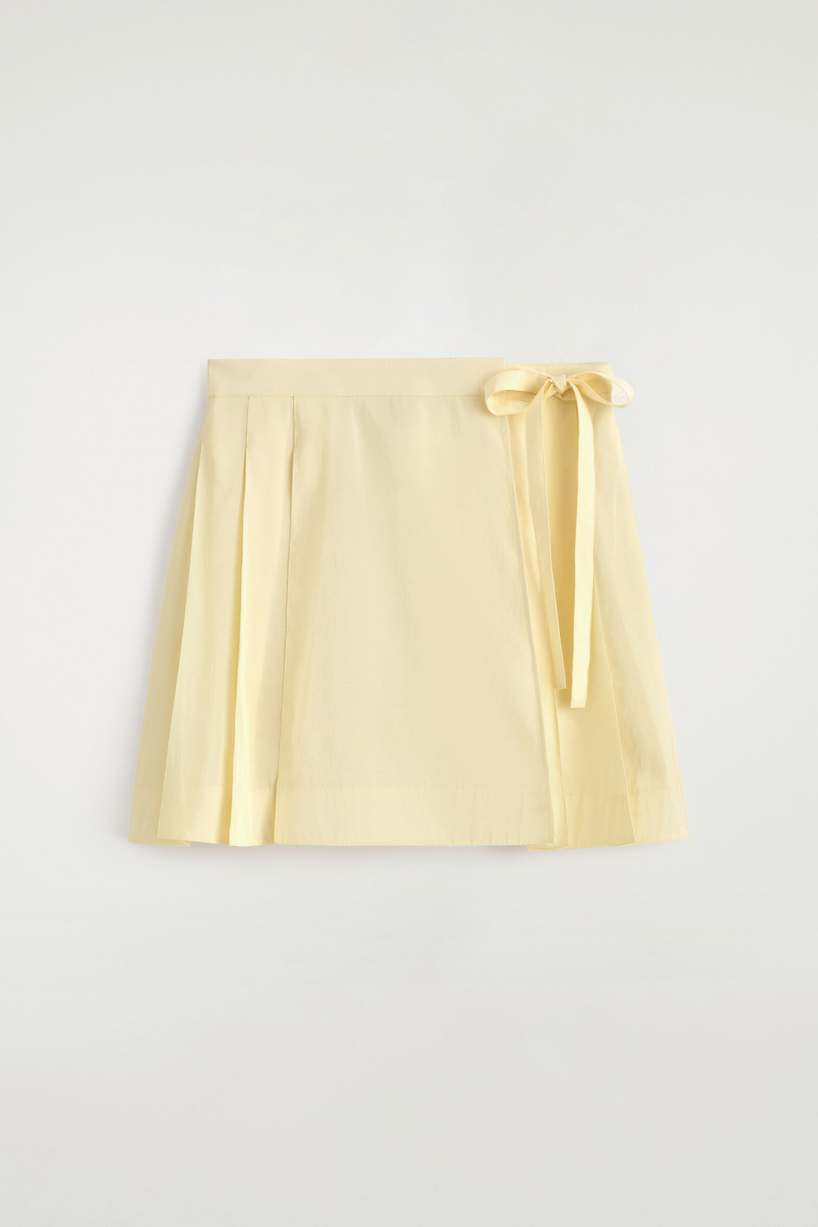 PLEATED MINI WRAP SKIRTBUTTER YELLOW