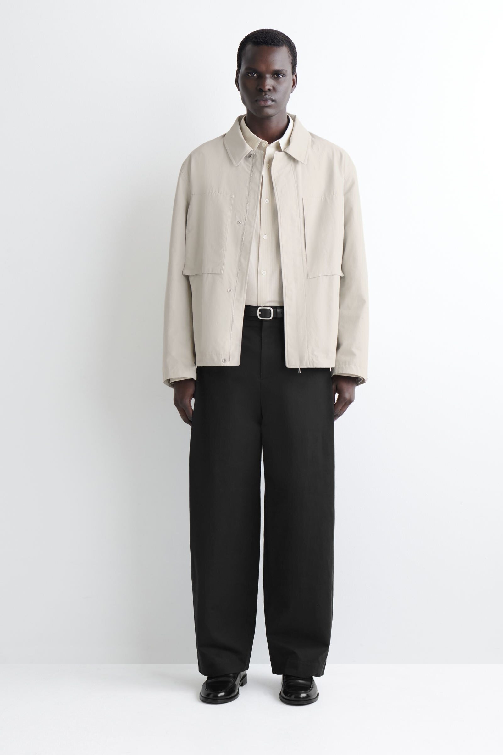 PLEATED COTTON RELAXED-FIT WIDE-LEG TROUSERSBLACK