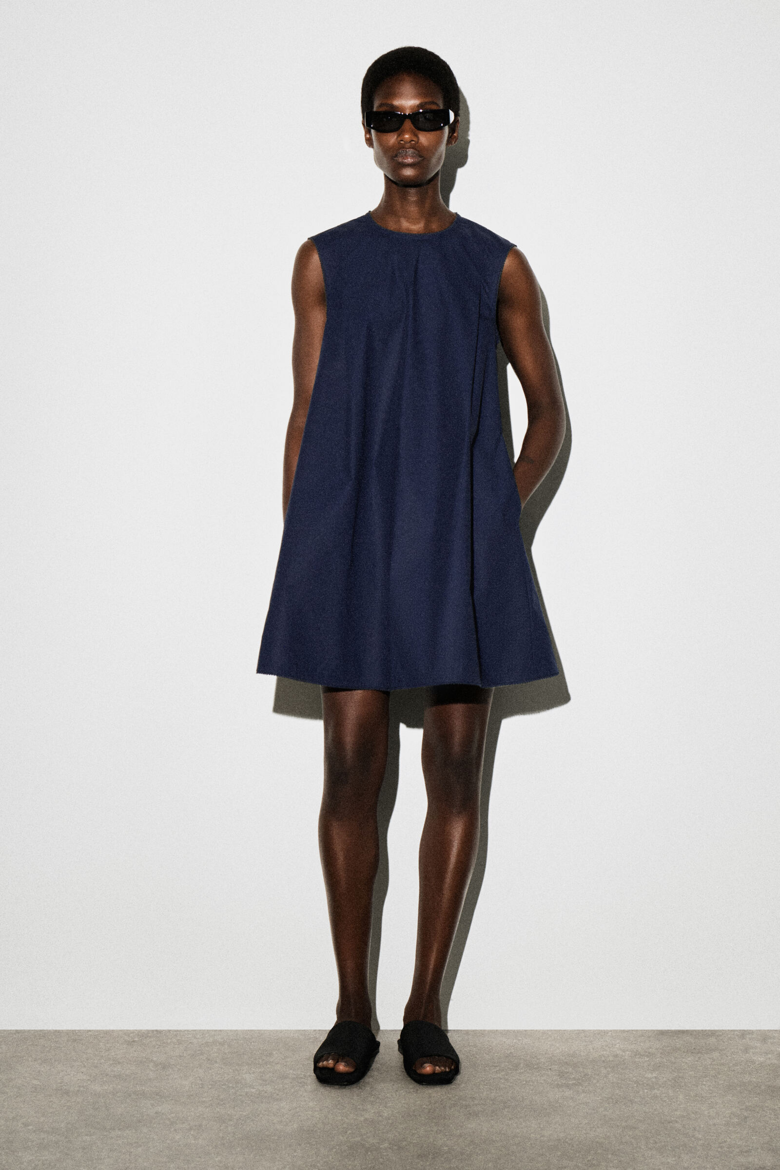 PICOT-TRIMMED PLEATED MINI DRESSNAVY