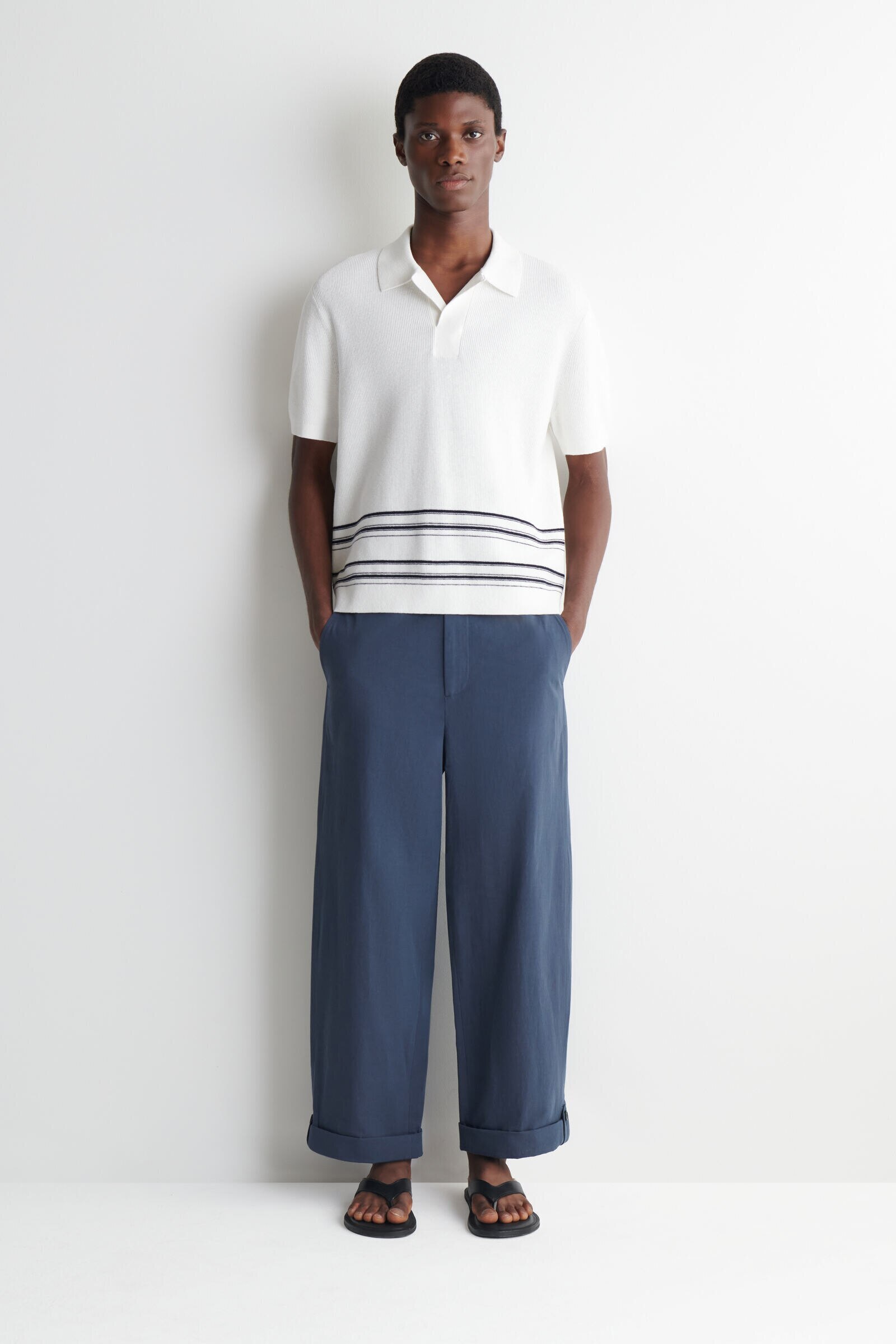 RELAXED-FIT STRAIGHT-LEG TURN-UP TROUSERSNAVY