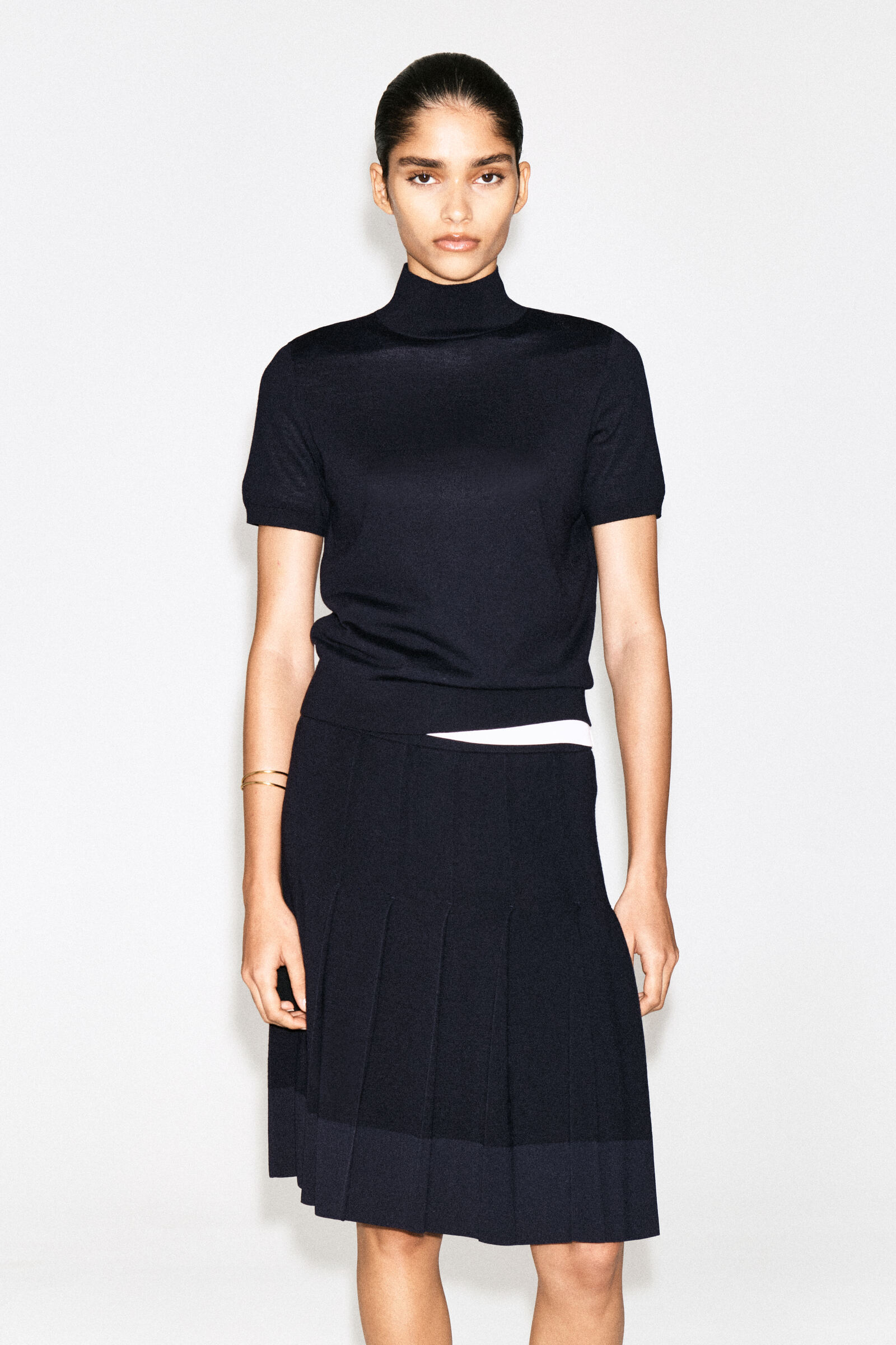 MERINO WOOL HIGH-NECK TOPNAVY