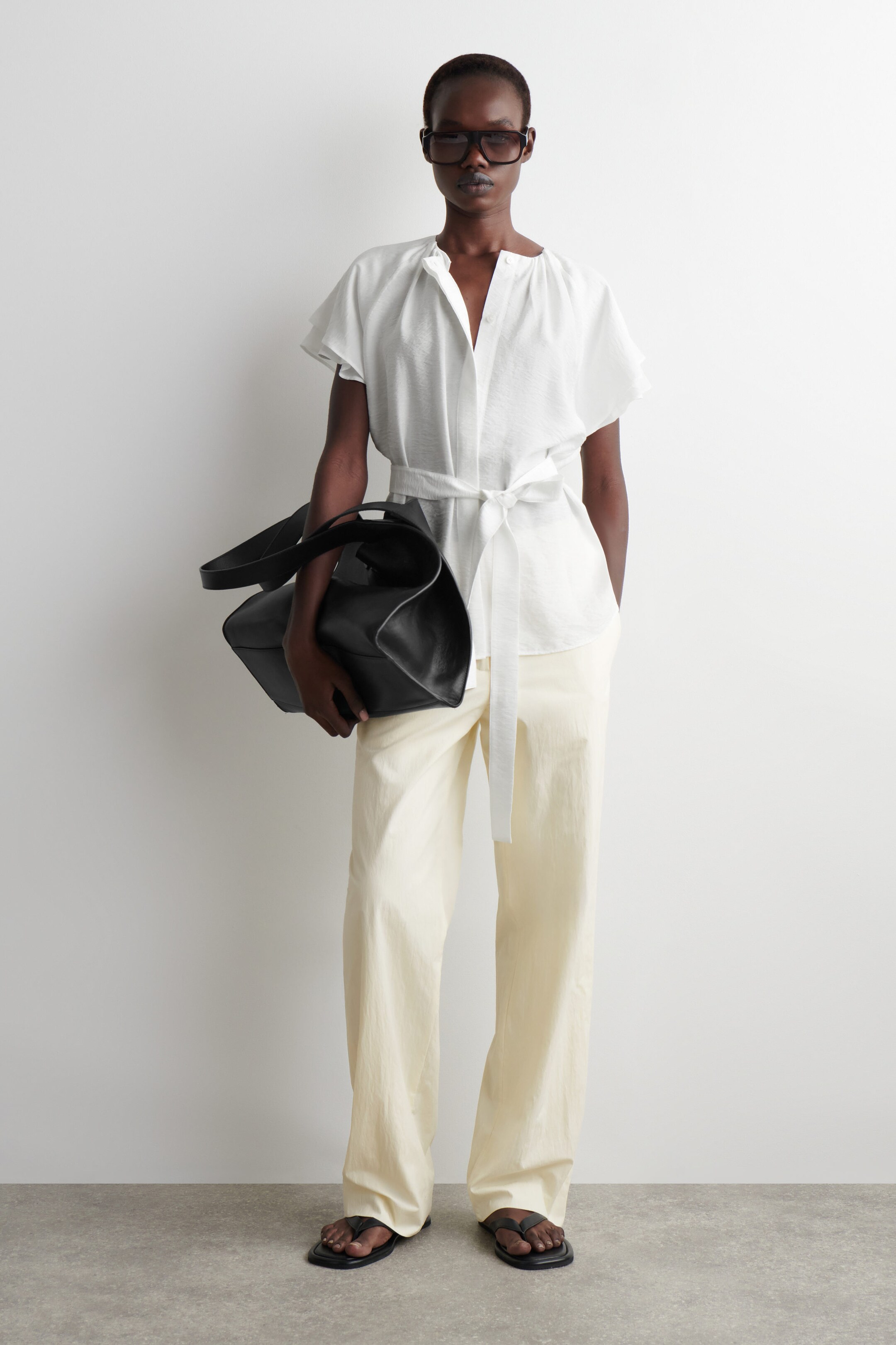 white belted blouse