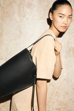 Placeholder for: Black leather bag